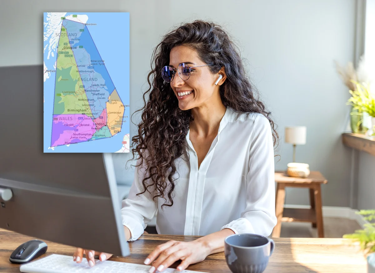 Woman uses dektop computer to view optimised delivery territories